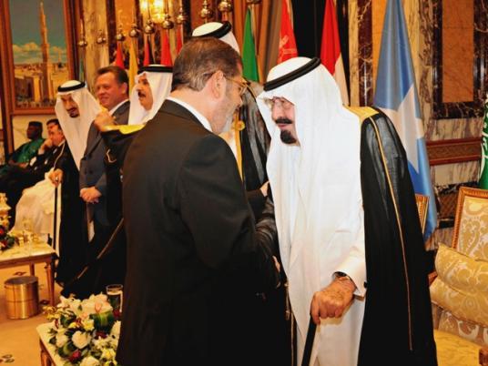 مرسي يُغادر القاهرة إلى السعودية للمشاركة في القمة الاقتصادية وأداء العمرة 1 2012-08-15t031147z_272698271_gm2e88f0v0i01_rtrmadp_3_syria-crisis