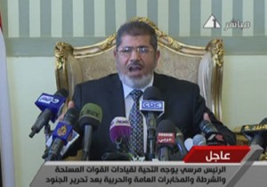 فيديو.. مرسي: أبناء مصر أثبتوا قدرتهم على حماية هيبة الدولة وأمن المواطنين 1 morsi-talking-1572