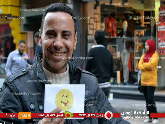 بالصور.."متفائلون الزقازيق " ينظمون حملة "اضحك ضحكتك حلوة" لرسم البسمة علي وجوه المواطنين 4 11