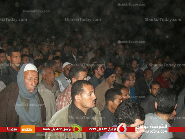 بالصور ..أهالي قرية «كفر عجيبة» بههيا يشيعون جثمان رقيب الشرطة القتيل 2 2