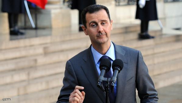 الأسد يترشح لفترة رئاسية ثالثة 1 Syrian president Bashar al-Assad gesture