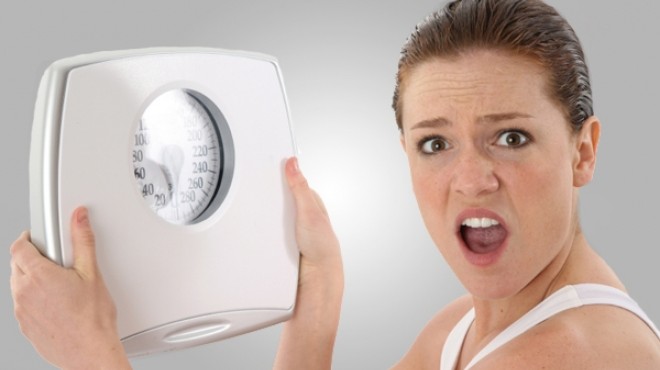 5 أخطاء تفسد عليكِ الريجيم 1 262835_Large_20140826050253_18