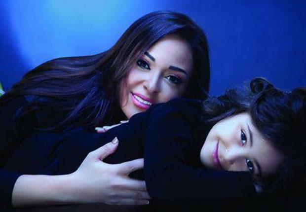 شاهد بالصور ..الشبه بين النجوم و أطفالهم 5 2014_12_24_12_41_57_57