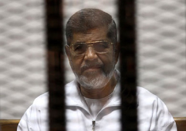 جنايات القاهرة : الحكم على مرسي و14 متهمًا في «أحداث الاتحادية» 21 أبريل 1 m.-morsy-courtttt