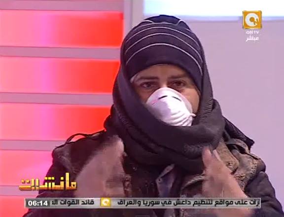 بالفيديو | القرموطى يخرج على الهواء بــ « طاقية وكوفية وكمامة» 1 10877760_789666087792096_6981106_n
