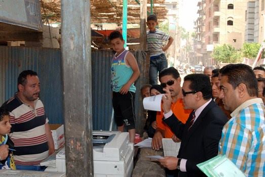 شاهد .. محافظ الشرقية : يتفقد مجمع خدمات الأحوال المدنية بالزقازيق 3 11141760_832558436831887_5111505977836903812_n