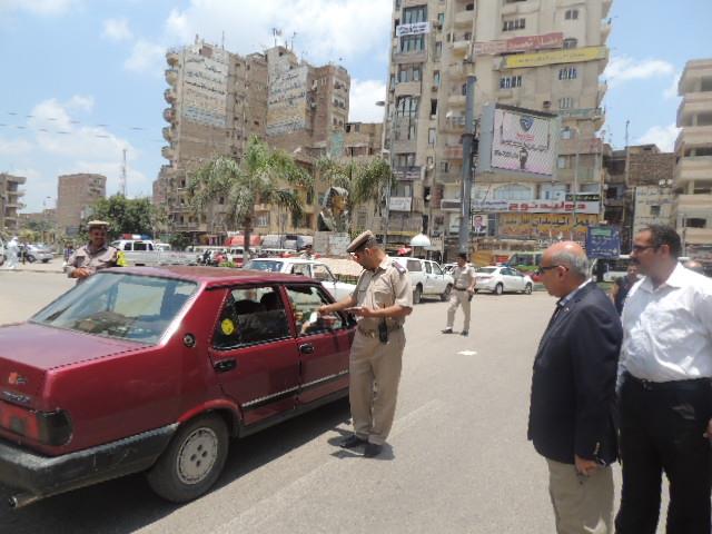 بالصور .. مدير امن الشرقية يوزع الإمساكيات الرمضانية على المواطنين بالزقازيق 6 10150620_715611265232898_2826437964116562640_n