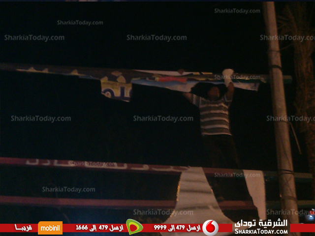 شاهد .. حملة لإزالة اللافتات بشارع الفالوجا بالزقازيق 1 لافتات 2