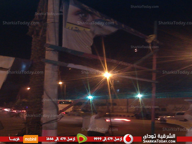 شاهد .. حملة لإزالة اللافتات بشارع الفالوجا بالزقازيق 2 لافتات