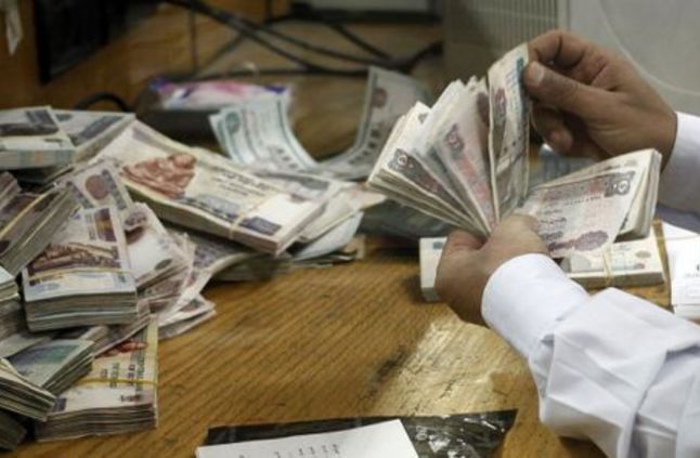 ضبط تاجر عملة بالزقازيق 1 ضبط تاجر عملة بالزقازيق