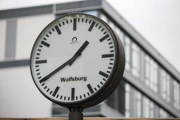 An analogue clock face shows the time in Wolfsburg, Germany, on Tuesday, Oct. 13, 2015. Volkswagen AG Chief Executive Officer Matthias Mueller faced employees at the German company's headquarters last week as pressure mounts to slash spending in the wake of the diesel-emissions scandal. Photographer: Krisztian Bocsi/Bloomberg via Getty Images