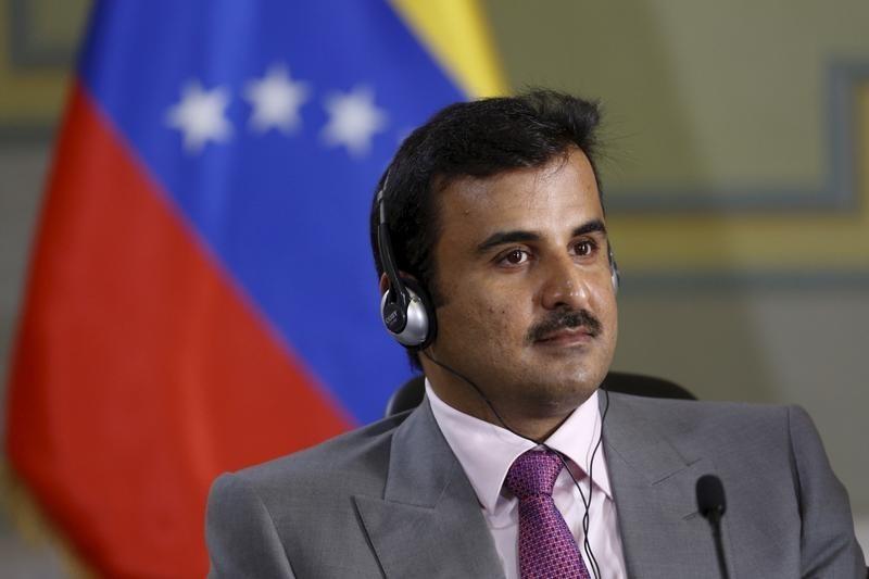 Qatar's Emir Sheikh Tamim Bin Hamad Al-Thani attends a meeting with Venezuela's President Nicolas Maduro at Miraflores Palace in Caracas