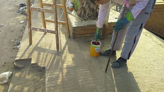أعمال النظافة وتجميل الشوارع بمدينة فاقوس