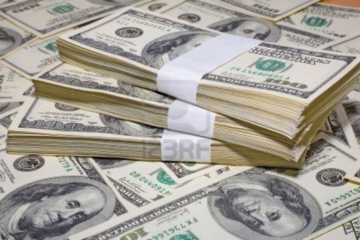 ضبط تاجر عملة بحوزته 115 ألف دولار بمنشأة أبوعمر 1 تاجر عملة
