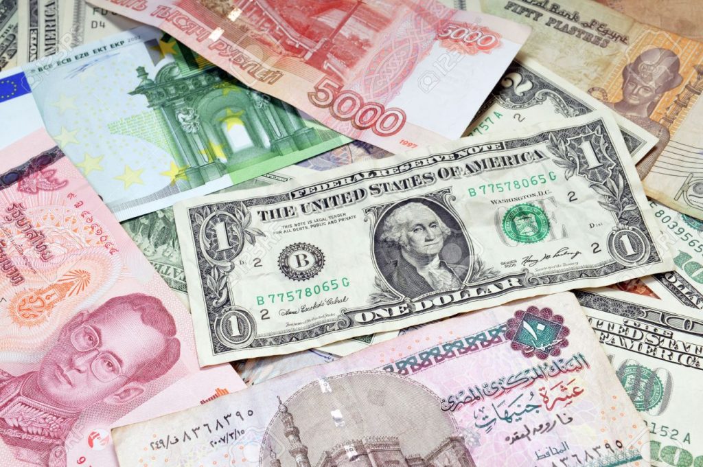 6895483 Money of the world Dollars euros russian roubles thai baht turkish lira egypt pounds Stock Photo