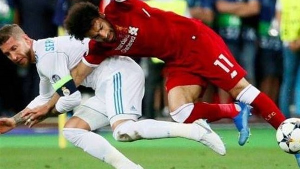 أول بلاغ رسمي ضد «راموس» لـ FIFA بعد تعمده إصابة محمد صلاح 2 راموس وصلاح