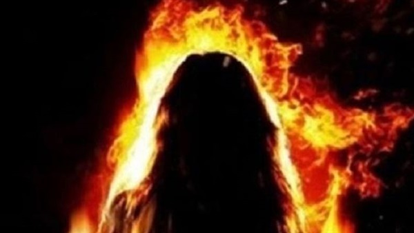 زوج يشعل النيران في زوجته بههيا