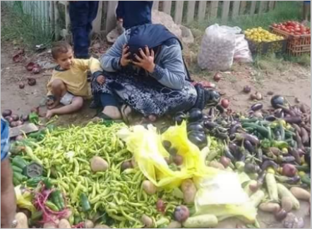القصة الكاملة لصورة بائعة الخضار في دمياط 3 9